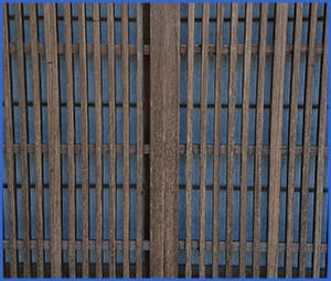 古い玄関扉の障子ガラスの画像